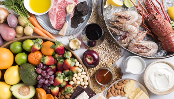 An image of a variety of WA food and beverage such as meat, seafood, fruit, wine and cheese