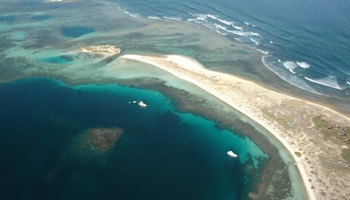 Arial image of boats using the public moorings at Morley Island Houtman Abrolhos Island